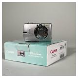 Canon PowerShot ELPH 300 HS | Camera in original box with spare battery and battery charging kit - w
