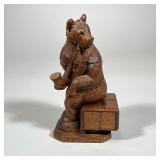 SMOKING BEAR BOX | Carved wood smoking bear figure seated on wood box with opening. - h. 9 x w. 3 x 