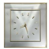 MID-CENTURY MIRRORED CLOCK | Mid-century modern brass and mirror wall clock, displays at an angle. -