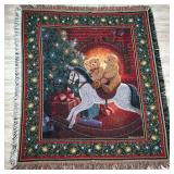 NEEDLEPOINT BLANKET | Christmas-themed needlepoint blanket showing two teddy bears on a rocking hors