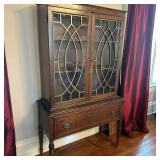China/Curio Cabinet | Queen Anne style China/curio cabinet featuring glass paned doors and one long 