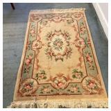 Art Deco Floral Area Rug | Art deco floral patterned area rug with fringed edges. - w. 48 x l. 82 in