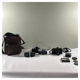 Cameras & Lens | Nikon Minolta camera, Yashica (Japan) camera and two Zykkor lens hoods.
