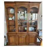 China Display Cabinet | Wooden triple cabinet with glass doors over lower cabinet doors.
