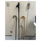 (4pc) Walking Canes | Set of four different walking canes. - h. 50 in (tallest)
