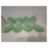 (8pc) Green Glass Plates | Vintage green glass plates with central swirl pattern. - dia. 8 in