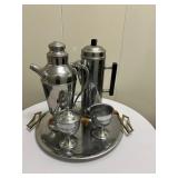 Misc. Coffee Set | Miscellaneous coffee set with metal coffee pitchers, creamer and sugar bowls, and