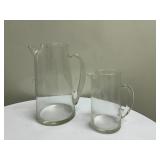 (2pc) Art Glass Pitchers | One large and one small art glass pitchers with "open top" handle and pin