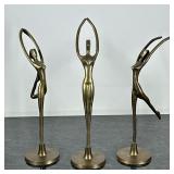 (3pc) BRASS DANCER FIGURINES | Set of 3 brass figures in dancing poses. - h. 12.25 x w. 5 in