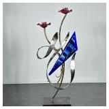 GARY ROSENTHAL FLOWER CANDLESTICKS | Flower-form mixed metal candlestick with colored glass. - h. 18