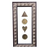 FRAMED ERTÈ MEDALLIONS | Romain de Tirtoff (1892-1990) Four framed Erté medallions in clear frame in