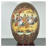 MONUMENTAL CERAMIC EGG | Monumental Asian ceramic egg decorated with figural scenes with flowers & b