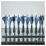 BORIS KRAMER (CANADA 1969-) MENORAH | Boris Kramer forged steel Menorah featuring abstract figures, 