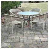 (5pc) WICKER PATIO SET | Wicker patio outdoor dining set including: round glass top table, and 4 rou