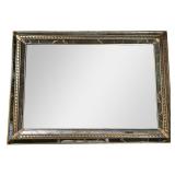 WALL MIRROR | Beveled glass mirror with gilt & patina border. - h. 30.5 x w. 42.5 in