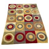 COLORFUL RUG | Colorful circular patterned rug. - w. 68 x l. 108 in