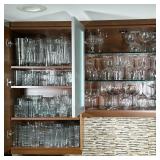 CABINET OF GLASSWARE | Large cabinets full of mixed glassware including; water glasses, wine glasses