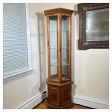 Traditional Curio Cabinet | Traditional style wooden curio cabinet with mirrored backing, plug-in li