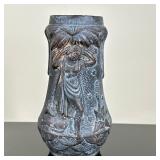 Brass or Copper Relief Vase | Brass or copper relief vase with detail of woman under a palm tree in 
