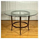 Round Glass Top Dining Table | Round glass top dining table on metal base with dark finish. - h. 30 
