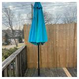 (2pc) Outdoor Umbrella & Stand | Outdoor umbrella on wrought iron stand with turn crank for opening 