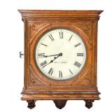Seth Thomas Wall Clock | With Roman numeral markers, carved oak case. - h. 23 x w. 18.5 x d. 5.25 in