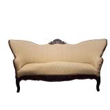 Antique Carved Settee | Victorian carved wood settee / loveseat with curved wood backrest and contin