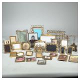 BRASS & COPPER PICTURE FRAMES | Large lot of brass & copper picture frames having floral patterns & 