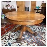 Oak Extension Dining Table | Carved solid oak, claw feet, round top, with three leaves (w. 9.75 in.)