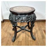 Chinese Carved Side Table | Dark or ebonized wood, with overall carved grape leaf motif, having a sh