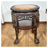 Chinese Carved Side Table | Overall carved decoration with an inset marble stone top over medial she