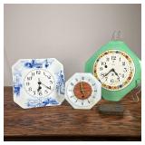 (3pc) Kitchen Clocks | Including an octagonal milk glass clock, a Delft-style 8 day clock, and a Mil