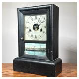 Seth Thomas Shelf Clock | Marked on the movement, ebonized wood case, enameled face with Roman numer