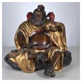 COLD PAINTED BRONZE CHINESE GUARDIAN FIGURE | With gilt, red, and silver paint. - h. 10 x w. 12 x d.
