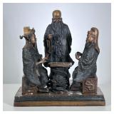 Large Bronze Chess Sculpture | Patinated bronze figural group of three Chinese scholars or elders in