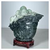 Chinese Carved Serpentine Figure | Scholar in a cup, with a wood stand and fitted box. - h. 6.25 x w