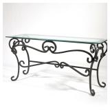 Metal & Glass Console Table | Thick beveled edge glass top over a scrolled metal base. - h. 27.25 x 