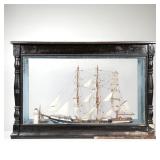 Large Model Ship | Ship Agnis in display case with water and lighthouse. - h. 23 x l. 34.5 x d. 14 i