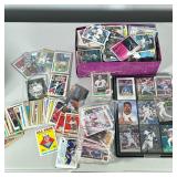 Baseball Card Collection | A large collection of baseball cards and other sports cards, some in prot