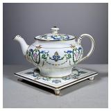 (2pc) Teapot with Trivet | This set with gold trim, fountains and vines is marked Mintons England an