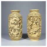 (2pc) Resin Covered Vases | A near pair: heavy, faux bone resin carved vases, one depicting a dragon