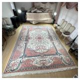 PAKISTANI WOOL RUG | Having large floral center with white and pink ground. - w. 130 x l. 178 in