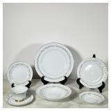 Meito China Service | Service for twelve, icluding cups and saucers, dinner plates, low bowls, and l