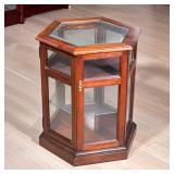 Hexagonal Display Table | Small side table display cabinet with three shelves and six glass sides. -