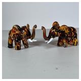 (2pc) Pair Glass Elephants | Blown feathered glass elephant figures in yellow and brown amber tones.