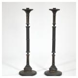 (2pc) Large Patinated Metal Floor-standing torchieres | Black metal pair of column candle stick hold