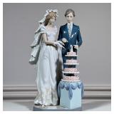 Lladro Bride & Groom | Porcelain Lladro figure showing a couple cutting wedding cake. Marked on bott