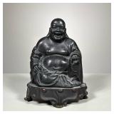 Stone Carved Buddha | Black stone carved Buddha sitting on attached stand. - h. 8 x w. 6 x d. 4.5 in