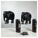 (5pc) Braswell Galleries African Carvings | Including a pair of elephants, a pair of figure sculptur