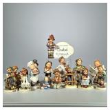 (15pc) Hummels | Variety of iconic Hummel figurines, including “School Boy”, "Little Pharmacist", a 